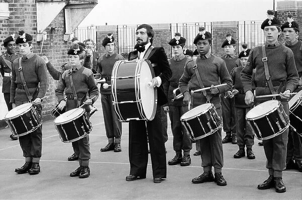Keith Moon, drummer of The Who rock group, on parade with an Army Cadet Corps in North