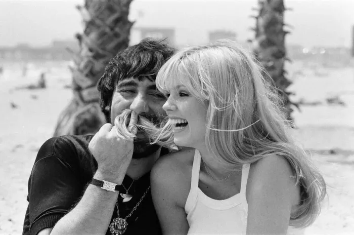 Framed Print : Keith Moon, drummer of The Who rock group with model Annette Lax in the resort of Malibu Framed Print : Keith Moon, drummer of The Who rock group with model Annette Lax in the resort of Malibu