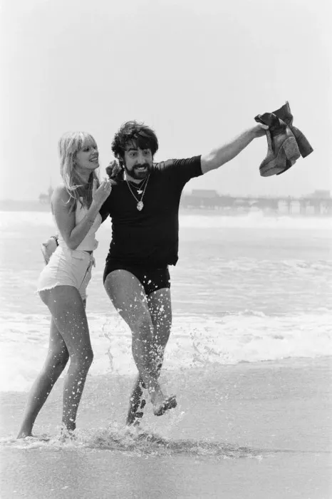 Framed Print : Keith Moon, drummer of The Who rock group with model Annette Lax in the resort of Malibu Framed Print : Keith Moon, drummer of The Who rock group with model Annette Lax in the resort of Malibu