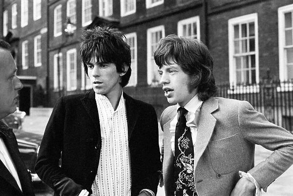 Keith Richards and Mick Jagger of The Rolling Stones. Having been released on bail