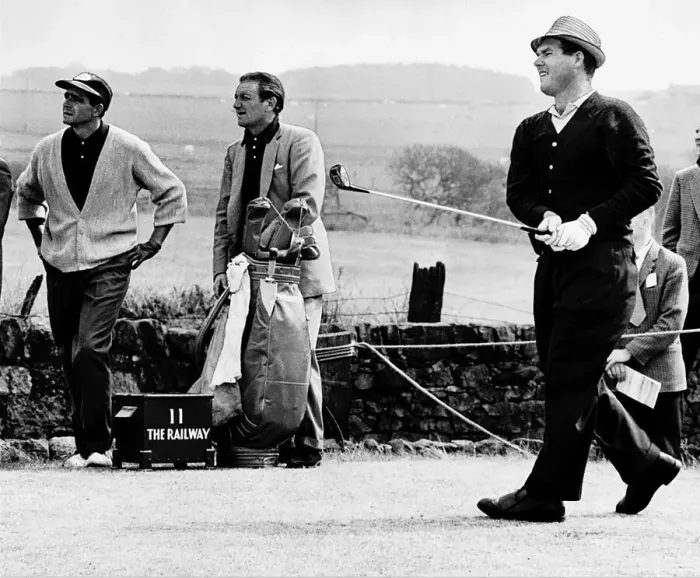 Framed Print : Kel Nagle watches his shot as does Spaniard Sebastian Miguel at the British Golf Open