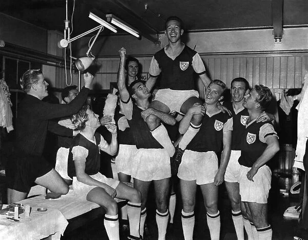 Ken Brown of West Ham picked to play for England. Being chaired by other members of