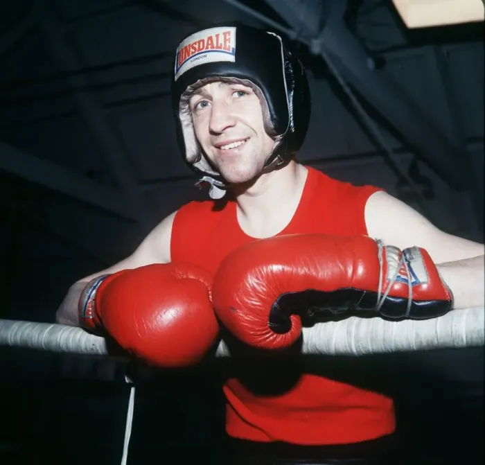 Framed Print : Ken Buchanan boxer 1979 in training gear gloves head protection lwaning on ropes