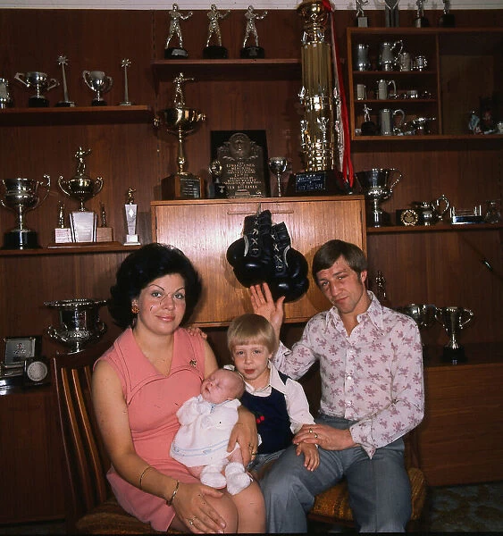 Ken Buchanan boxer July 1975 Waving to camera with wife Carol baby Karen