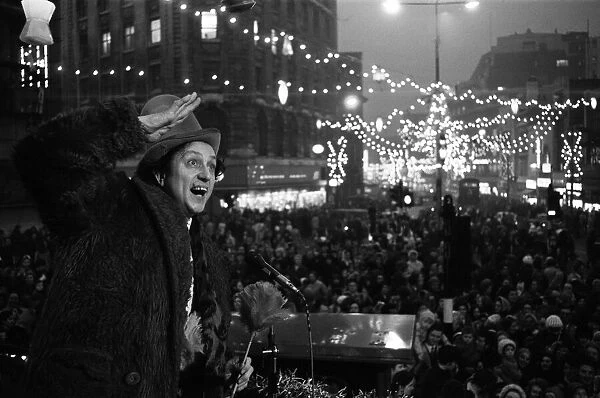 Ken Dodd with his Diddymen after after switching on the Christmas lights in the centre of