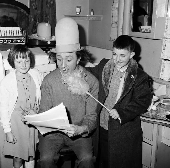 Framed Print : Ken Dodd in his dressing room at the Palladium with children. 13th December 1965