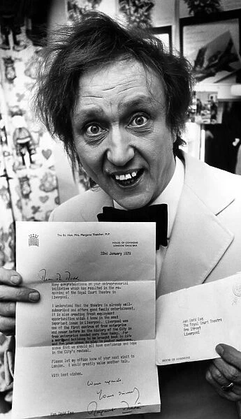 Ken Dodd hold a letter from Margaret Thatcher, congratulating him on his