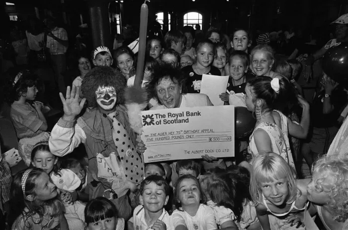 Framed Print : Ken Dodd joins forces with Jimbo the clown and the kids at the Albert Dock