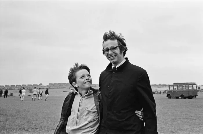 Framed Print : Ken Loach, (film director) on the school football playing field