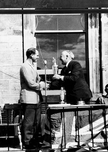 Ken Nagle is presented with the British Golf Open trophy