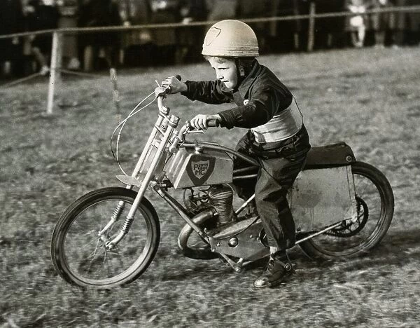 Kenneth McGuire aged 8 years old May 1950 Mascot of Perth Motor Club riding his