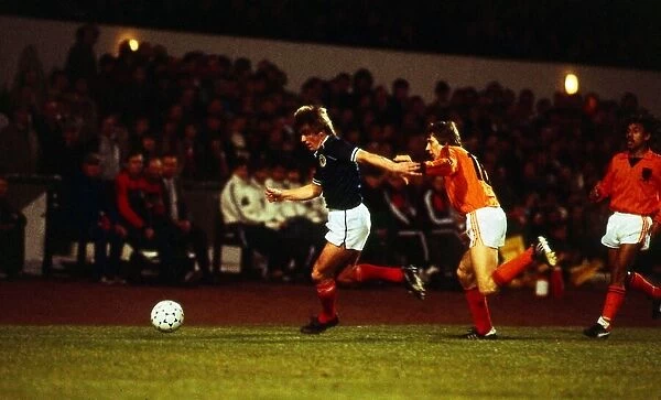 Kenny Dalglish & Arnold Muhren in action March 1982