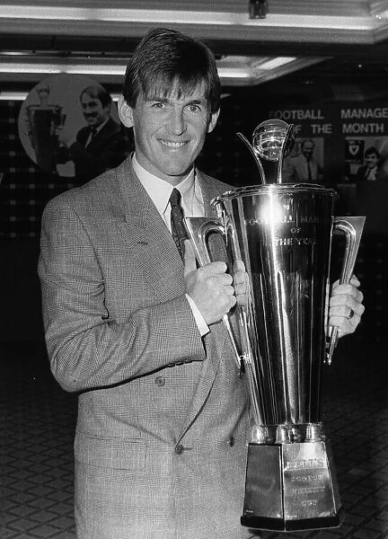 Kenny Dalglish of Liverpool with Manager of Year Cup 1986
