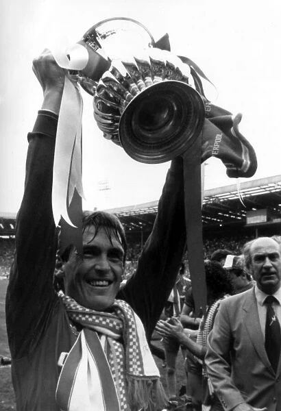 Kenny Dalglish, Liverpool player manager, celebrates after winning the FA Cup Final