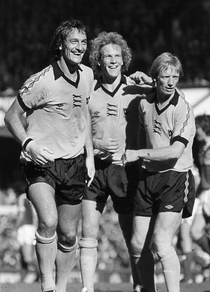 Kenny Hibbitt (left) and Willie Carr (right) congratulate new team mate Andy Gray (centre