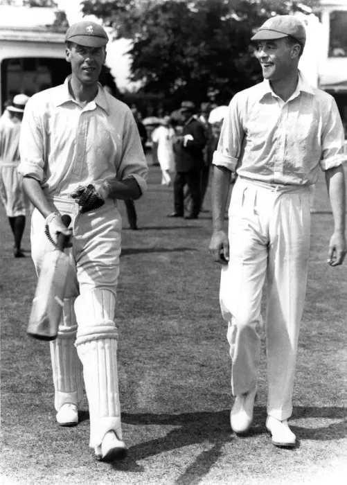 Framed Print : Kent v Middlesex at Canterbury. Frank Woolley of Kent on the left walks out to bat
