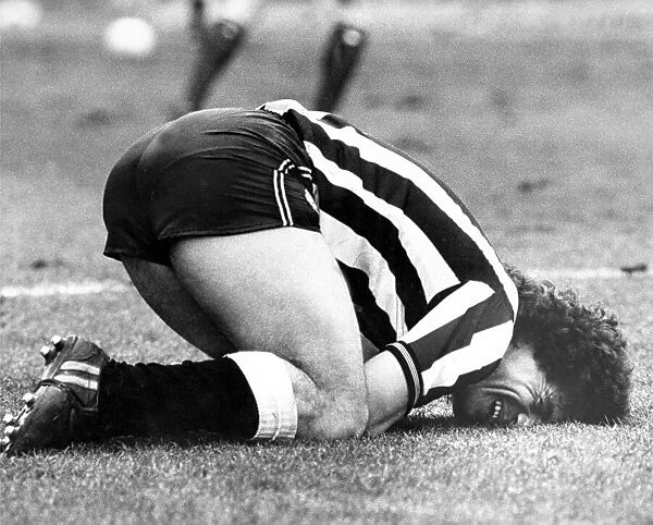 Kevin Keegan injured after crashing into the Grimsby keeper. Circa 1983