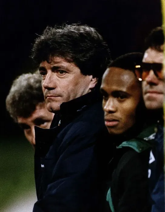 Framed Print : Kevin Keegan manager for Newcastle United watches the game form the dug out