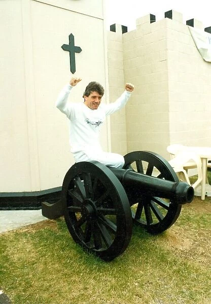 Kevin Keegan sitting on a cannon