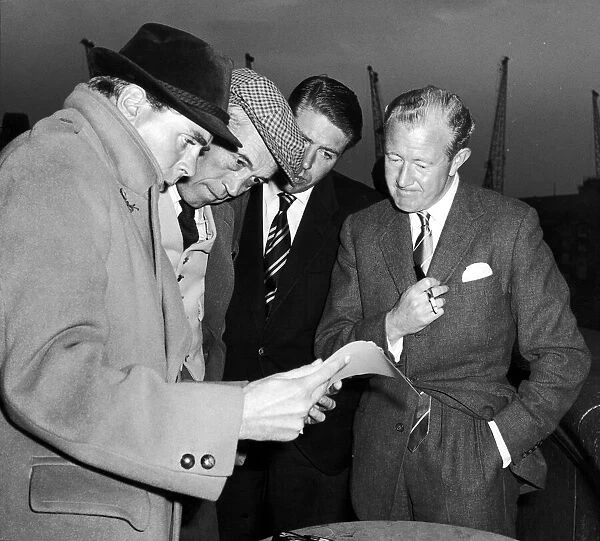 Kevin McClory, film producer, with John Huston, director