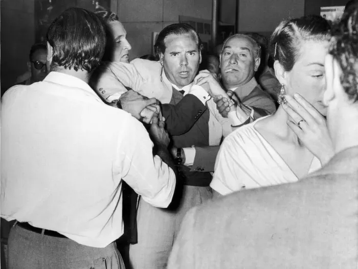 Framed Print : Kevin McClory, film producer, being restrained in bar room brawl with London film critic Framed Print : Kevin McClory, film producer, being restrained in bar room brawl with London film critic