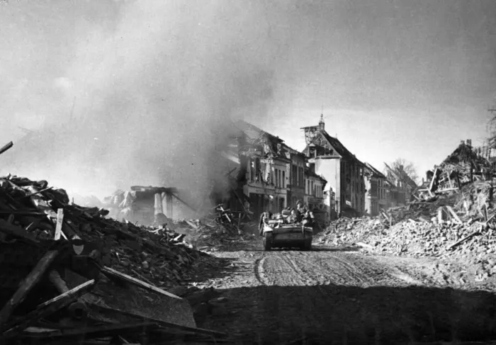 Framed Print : The key point town of Goch, now cleared of the Germans by British troops is being Framed Print : The key point town of Goch, now cleared of the Germans by British troops is being