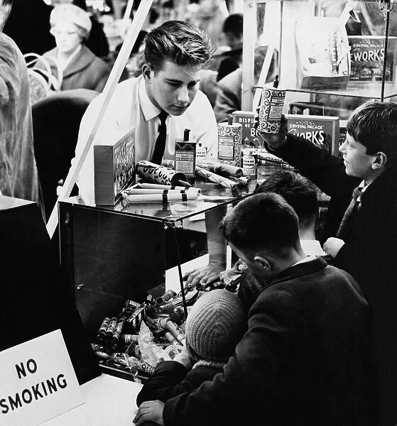 Kids buying fireworks at a store in Birmingham, West Midlands. 4th November 1962
