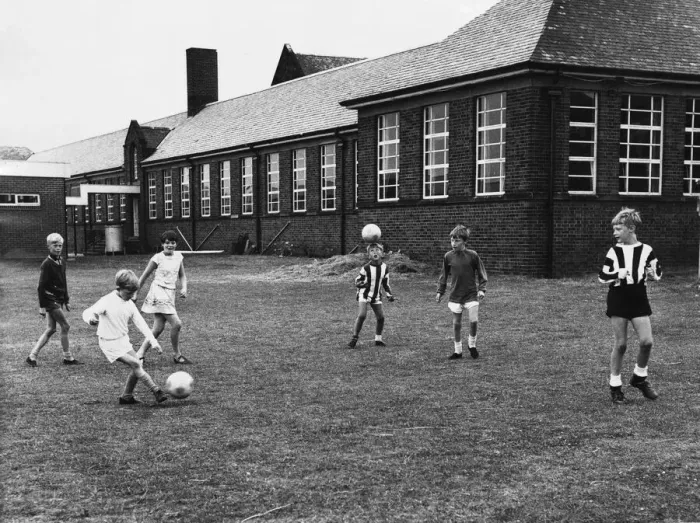 Framed Print : Kids playing a game of Football at Ravenswood Junior School Ravenswood Road