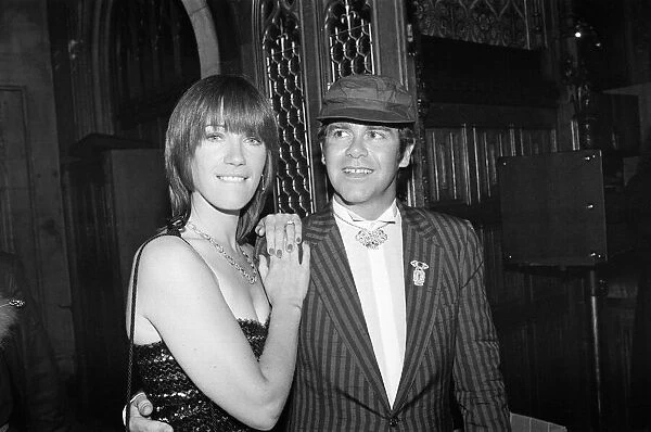 Kiki Dee and Elton John attend a House of Commons reception