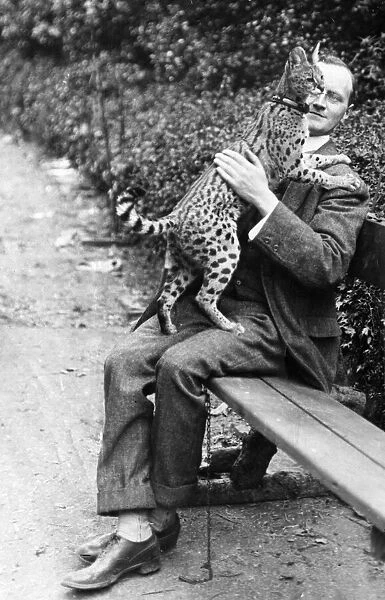 Not the kind of pet everyone would like. This is a Serval in the arms of Mr Gillespie at