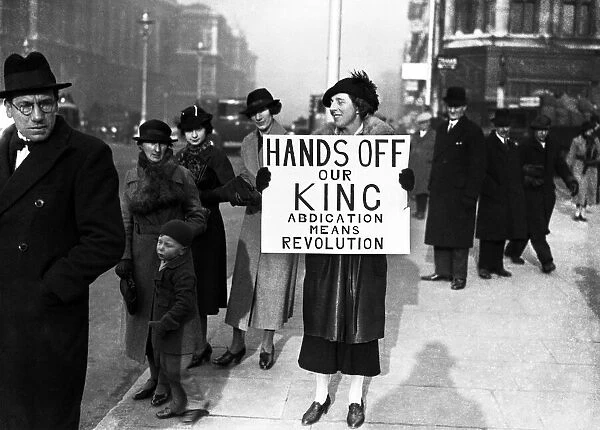 King Edward VIII Abdication Crisis December 1936. A woman holding a banner outside