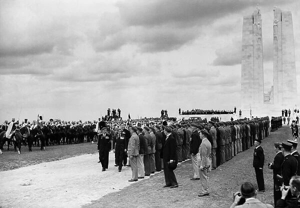 King Edward VIII, in his capacity as King of Canada, inspecting veterans at the opening