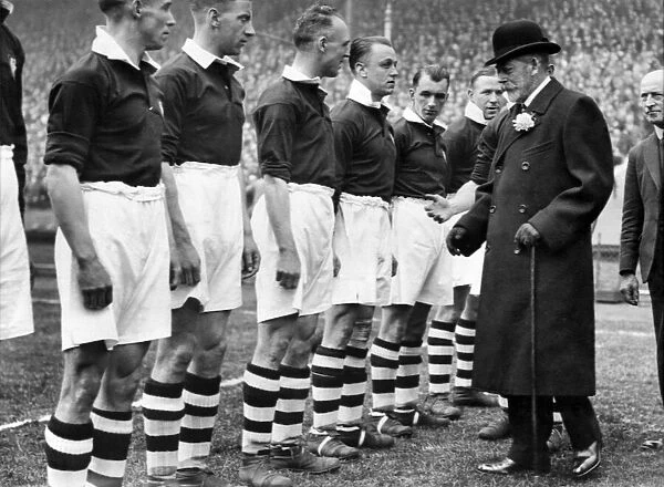 King George v. (Five) at F. A. Cup Final at Wembley greet the Manchester City team