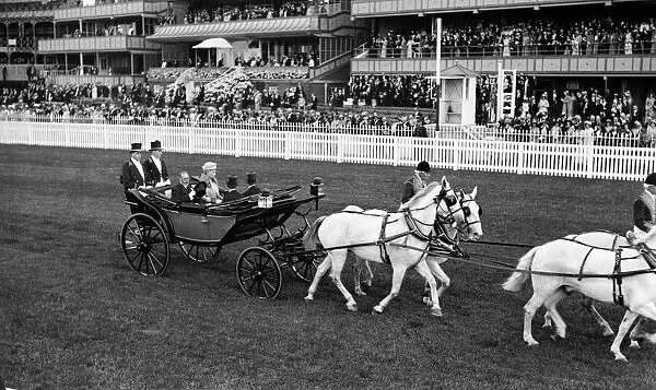 King George V and Queen Mary arrive at Ascot in horse drawn carriage with white horses