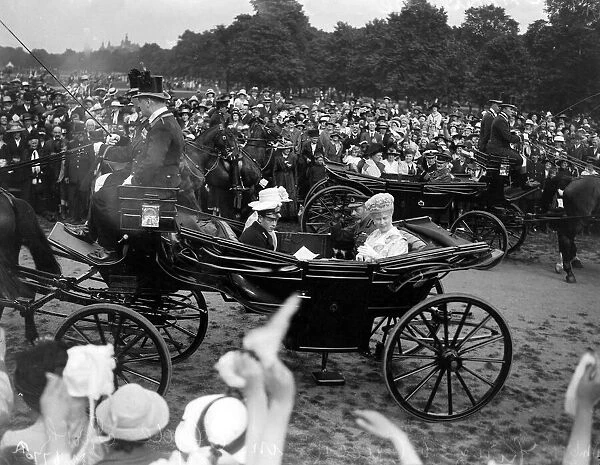 King George V and Queen Mary seen here in Hyde Park watching people dance during