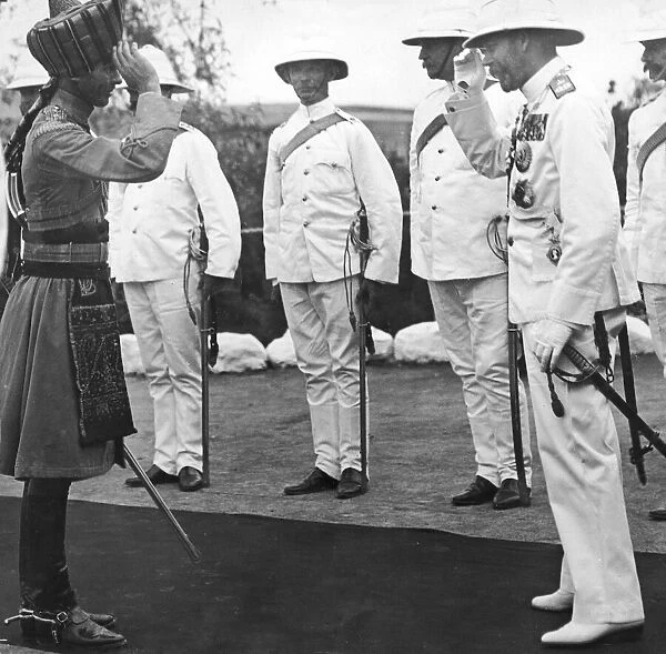 King George V returning the salute of an Indian Officer at Aden