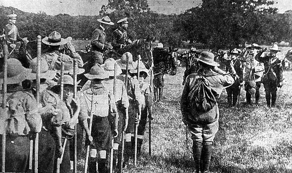 King George V with Sir Robert Baden Powell in 1911 reviewing the boy scouts at a