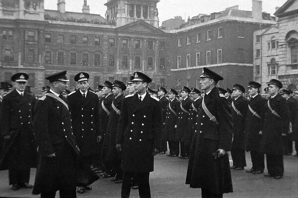 King George VI inspects the officers and crew of HMS Ajax