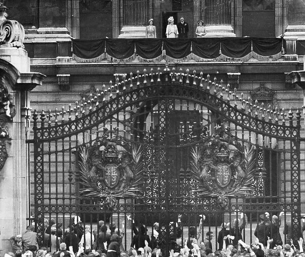 King George VI, Queen Elizabeth, flanked by Princess Elizabeth (far left