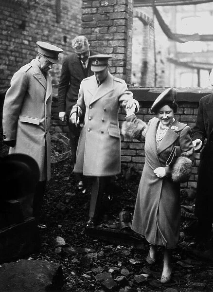 King George VI and Queen Elizabeth  /  Queen Mother visit bomb damaged London