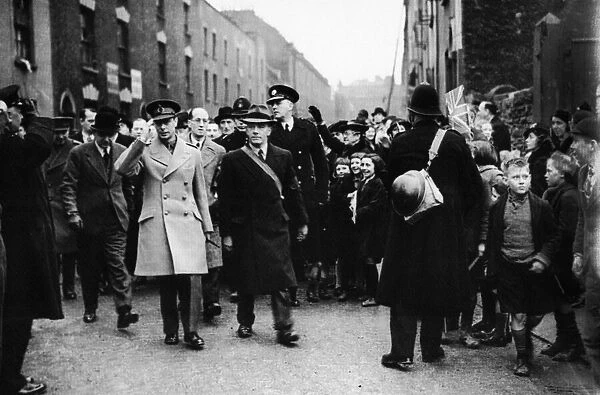 King George VI visits the bomb damaged city of Bristol following an air raid