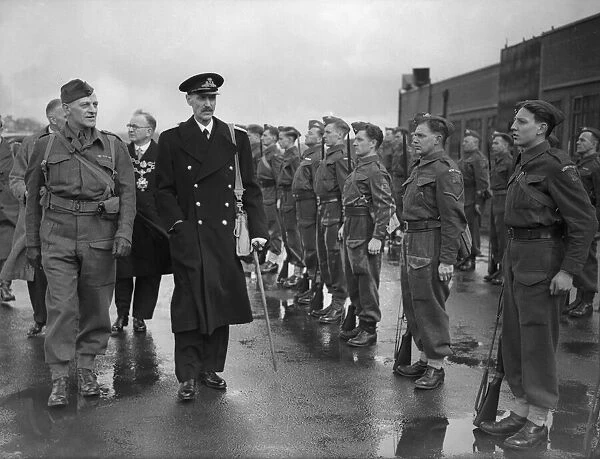 King Haakon of Norway inspects a Guard of Honour by the Birmingham Zone of the Home Guard