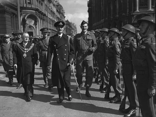 King Haakon of Norway inspects a Guard of Honour on 8th April 1942, accompanied by Col. J