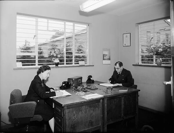King and Hutchings accountants office, Mr Gadsby seen here with his secretary