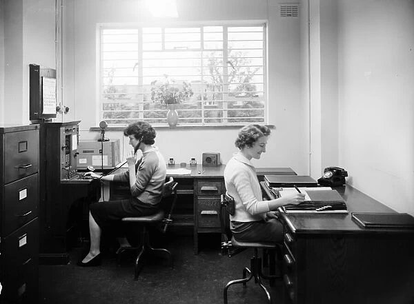 King and Hutchings office and switchboard. 1st October 1958