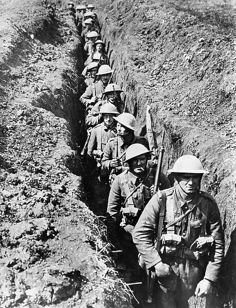 The Kings Liverpool Regiment moving along a communication trench leading to