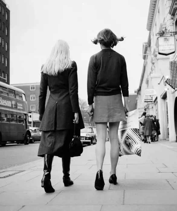 Framed Print : Kings Road, Chelsea. Fashion battlefield with a showdown between the Midi skirt