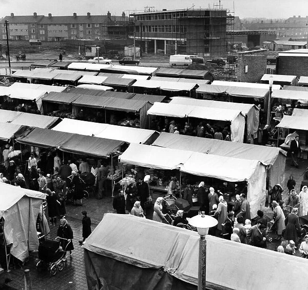 Kirkbys town market at a time when it was crowded with shoppers. 26th April 1961