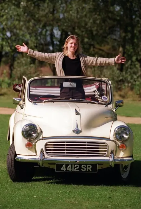 Framed Print : Kirsty Morgan standing inside her Morris Minor Tourer 16th Septeber 1997