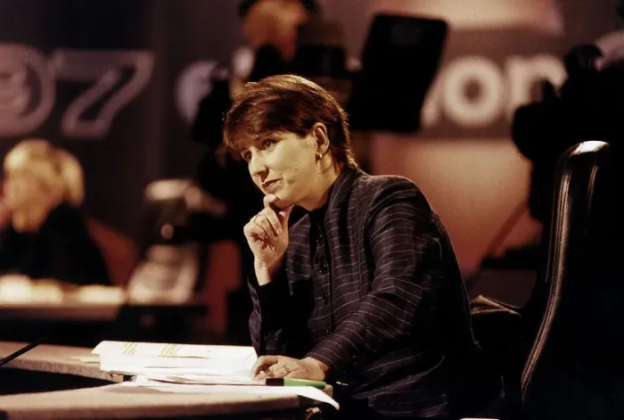 Framed Print : Kirsty Wark TV Presenter during Election results program sitting at desk in studio hand Framed Print : Kirsty Wark TV Presenter during Election results program sitting at desk in studio hand